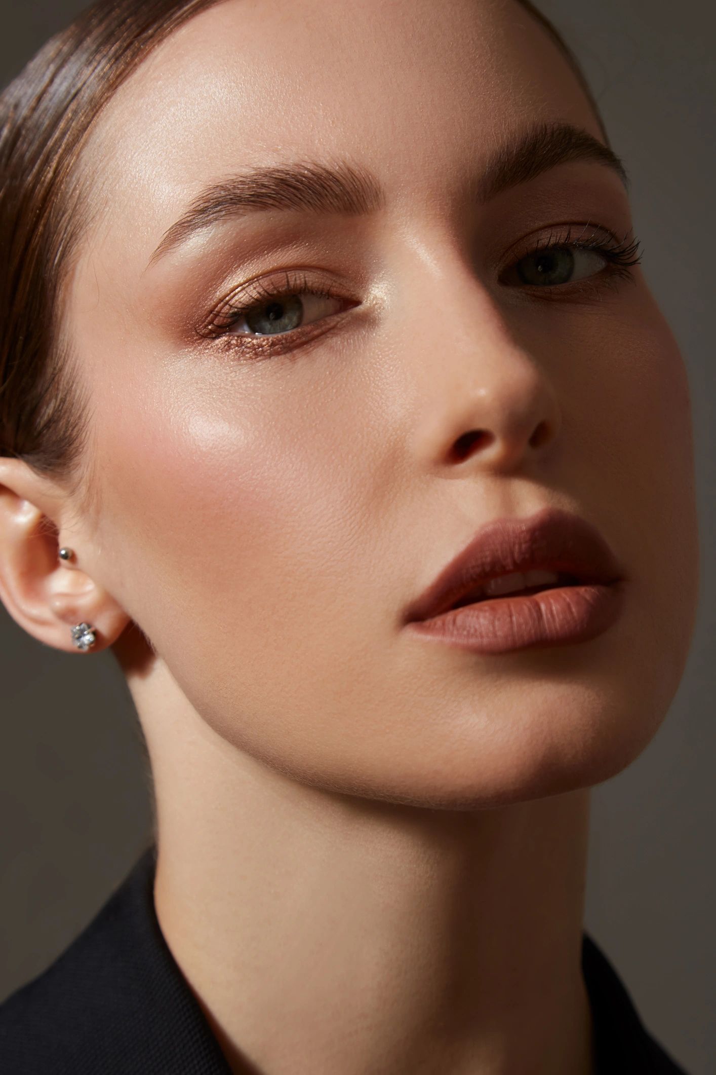 Natural, polished beauty portrait highlighting brows and lashes