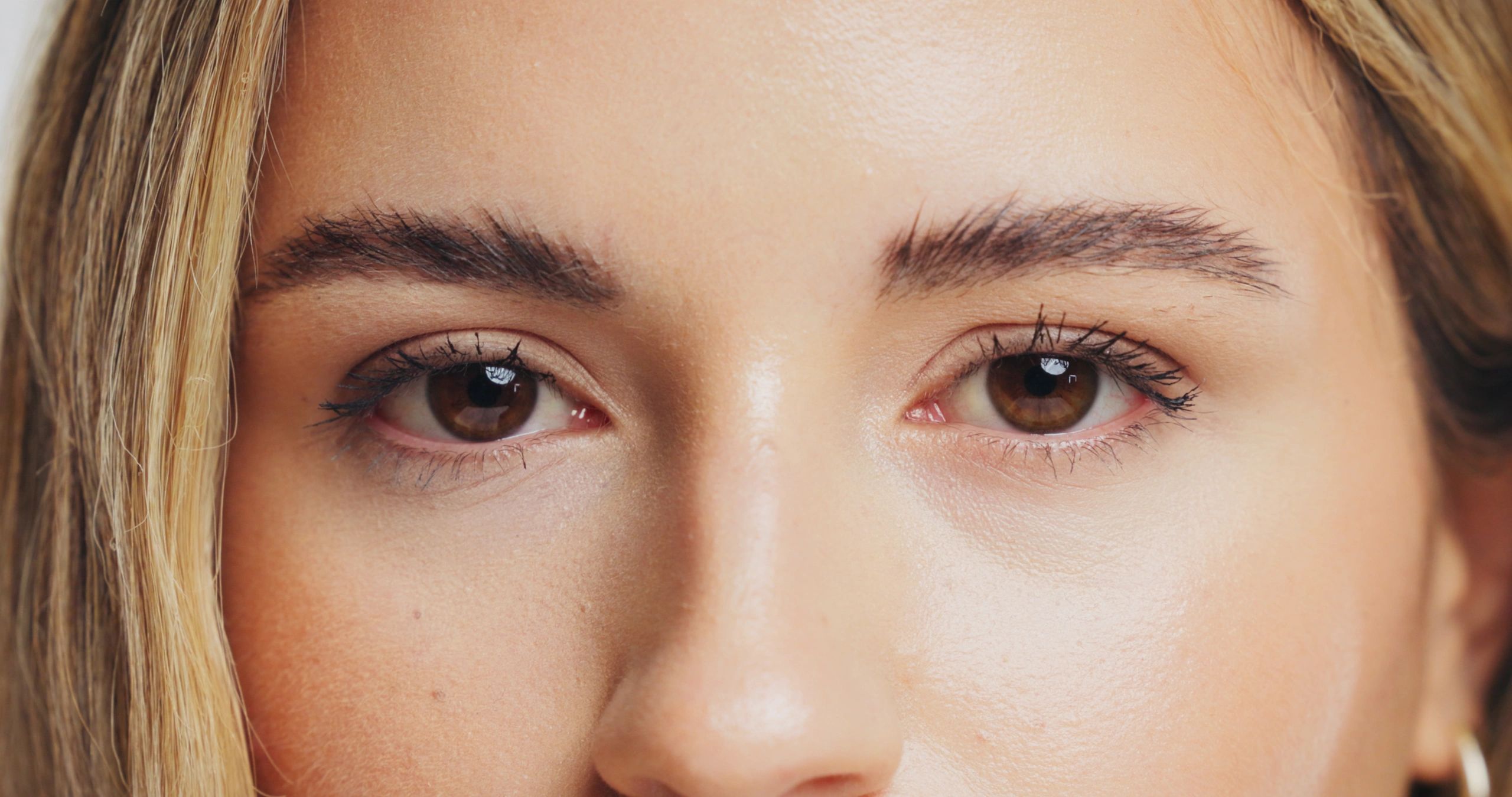 Close-up of eyes with laminated brows and lashes